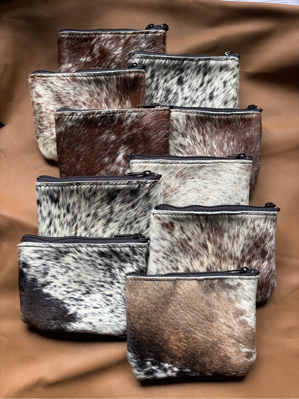 Cowhide medium zipper pouches